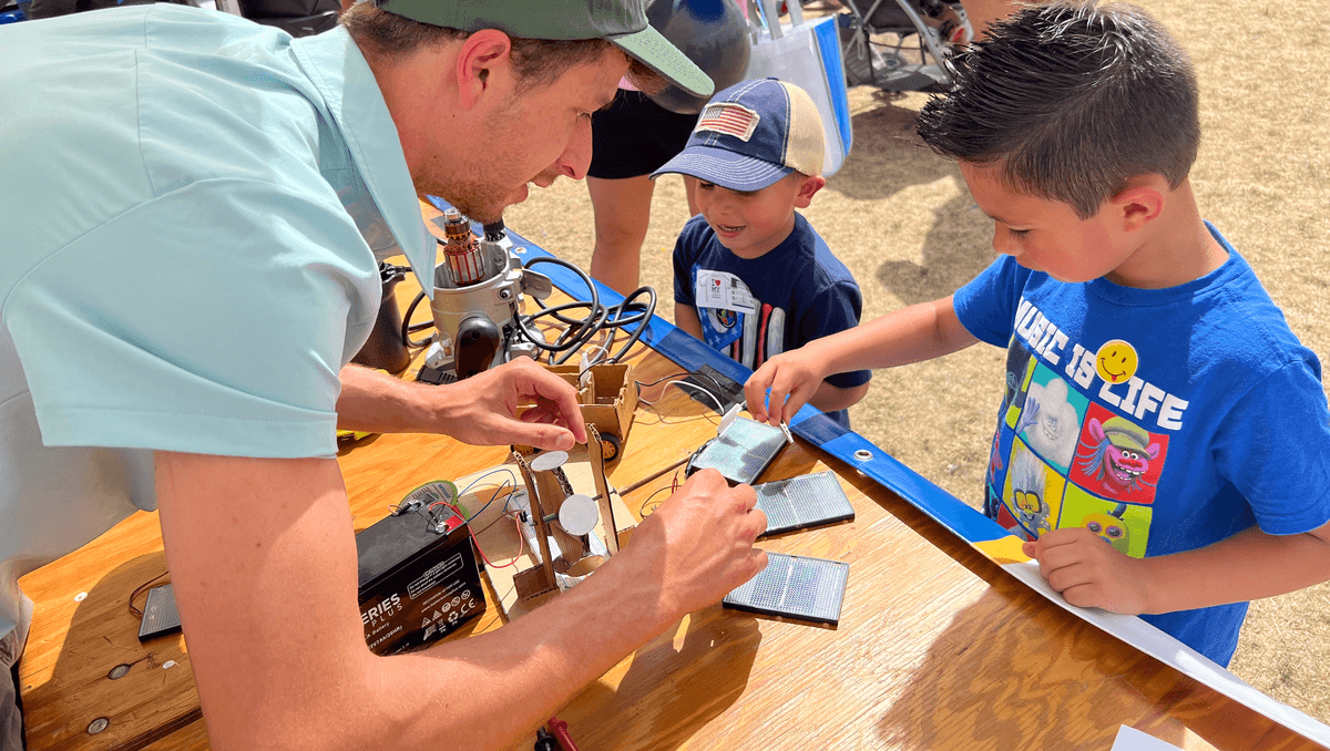 Mike working with students